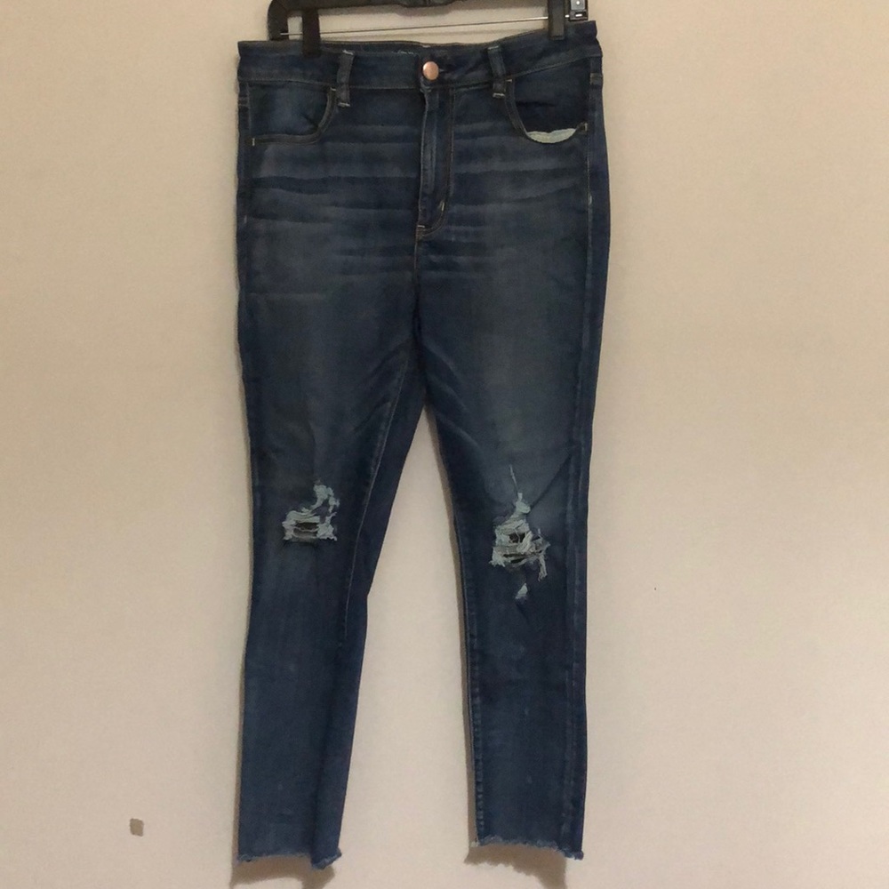 Jeans with cut outs and distressed details
